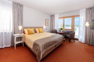 Postel nebo postele na pokoji v ubytování Wittlers Hotel
