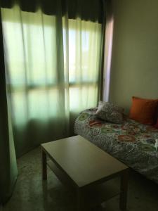 Katil atau katil-katil dalam bilik di Estudio frente al mar