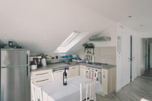 Kuchyňa alebo kuchynka v ubytovaní Apartment Marghareta