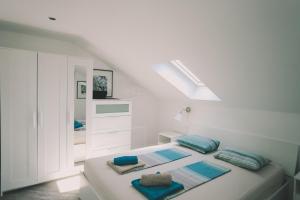 Posteľ alebo postele v izbe v ubytovaní Apartment Marghareta