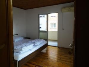 Postel nebo postele na pokoji v ubytování Buff Hostel Tirana