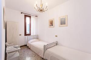 Postel nebo postele na pokoji v ubytování Prince Apartments