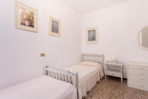 Łóżko lub łóżka w pokoju w obiekcie Prince Apartments
