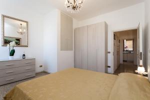 Łóżko lub łóżka w pokoju w obiekcie Prince Apartments