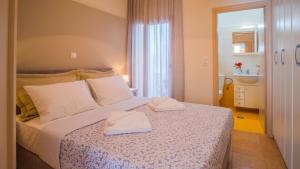 Posteľ alebo postele v izbe v ubytovaní Maribella Residence Old Town Rethymno