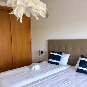 Кровать или кровати в номере Âncora Boutique Apartments