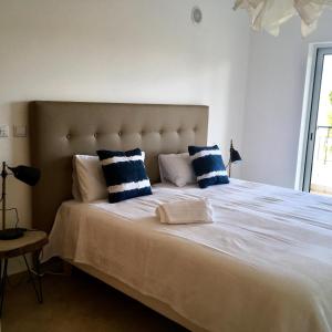 Кровать или кровати в номере Âncora Boutique Apartments