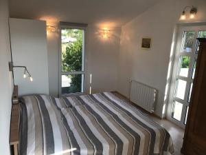 Posteľ alebo postele v izbe v ubytovaní Appartement Mila