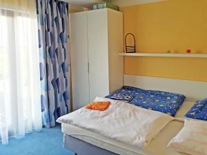 Posteľ alebo postele v izbe v ubytovaní Lake View Apartments near Golf Resort Kunětická Hora, Dříteč