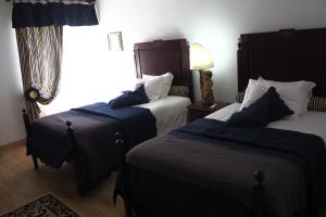 Een bed of bedden in een kamer bij Casa do Massorim