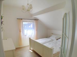 Posteľ alebo postele v izbe v ubytovaní Lake View Apartments near Golf Resort Kunětická Hora, Dříteč