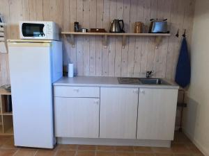 Kuchyň nebo kuchyňský kout v ubytování Strågården Nyord