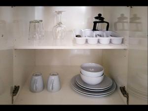 Kuchyň nebo kuchyňský kout v ubytování Grand Central Serviced Apartments