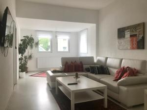 Zona de estar de Clean&Comfort Apartments Near Hannover Fairgrounds