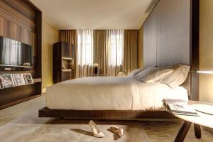 Letto o letti in una camera di ME Milan Il Duca
