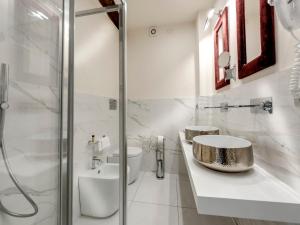 Koupelna v ubytování Hotel Palagi