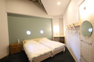 Postel nebo postele na pokoji v ubytování Hostel Tomar