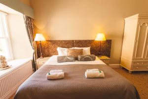 Raasay House Hotel客房内的一张或多张床位