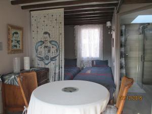 Posezení v ubytování Maison TOMAS