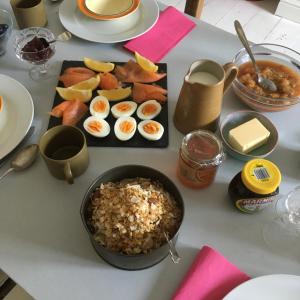 a table with eggs and food on a table at Stone street in Faversham