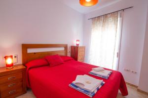 Postel nebo postele na pokoji v ubytování Apartamentos Manuel Martin + 37 fotografií