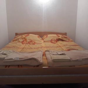 Postel nebo postele na pokoji v ubytování Apartmani Sastavci