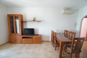 TV a/nebo společenská místnost v ubytování Apartamentos Manuel Martin
