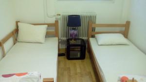 Postel nebo postele na pokoji v ubytování Hostel Jellostone
