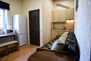 Kuchyň nebo kuchyňský kout v ubytování Logovo Hostel