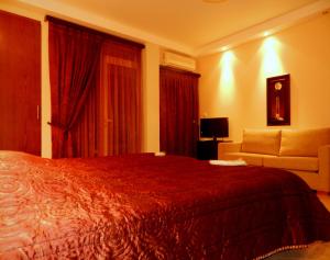 Voodi või voodid majutusasutuse Plaza Hotel toas