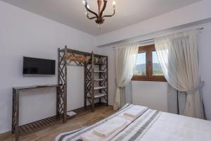 Fotografie z fotogalerie ubytování Zeus & Dione Luxury Villa v destinaci Lagolíon + 41 fotografií