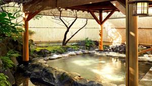 Κήπος έξω από το Laforet Ito Onsen Yunoniwa