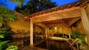 Κήπος έξω από το Laforet Ito Onsen Yunoniwa