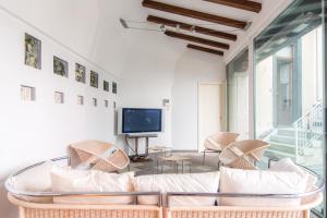 Μια τηλεόραση ή/και κέντρο ψυχαγωγίας στο Villa Giù Luxury - The House Of Travelers