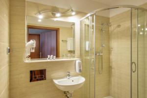 Kúpeľňa v ubytovaní Hotel Krakus
