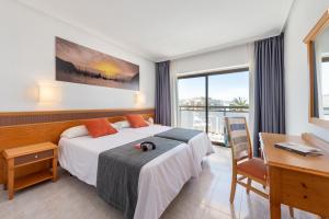 Cama o camas de una habitación en Hotel Vibra Mare Nostrum