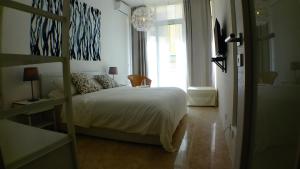 Postel nebo postele na pokoji v ubytování R1102ERI by euroresort