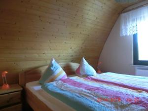 Postel nebo postele na pokoji v ubytování Ferienwohnung Luzinblick