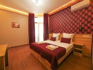 Postel nebo postele na pokoji v ubytování La'Rooms