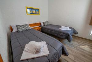 Posteľ alebo postele v izbe v ubytovaní Apartamentos AR Muntanya Mar