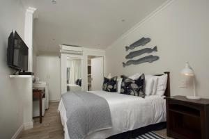 מיטה או מיטות בחדר ב-Ocean Hideaway Bed and Breakfast