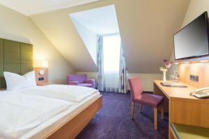 Postel nebo postele na pokoji v ubytování Hotel - Restaurant Erich Rödiger