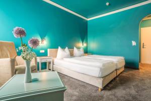 Postel nebo postele na pokoji v ubytování Hotel - Restaurant Erich Rödiger