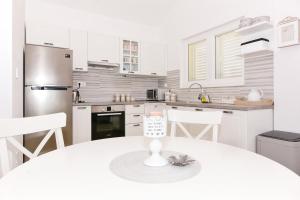 Kuchyň nebo kuchyňský kout v ubytování Apartment Nadoveza