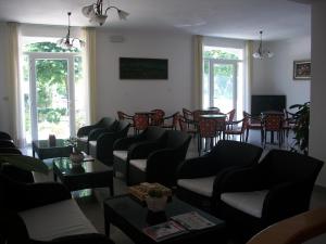 TV a/nebo společenská místnost v ubytování Hotel Liliana