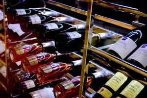 a bunch of bottles of wine on display at Vanilla Garden Boutique Hotel - Adults Only in Playa de las Americas