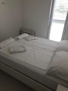 Postel nebo postele na pokoji v ubytování Apartment Zamarin 2
