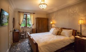 Postel nebo postele na pokoji v ubytování Ghan House
