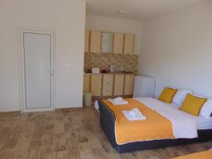 Postel nebo postele na pokoji v ubytování Apartments Bibic