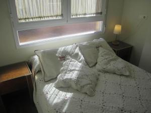 Posteľ alebo postele v izbe v ubytovaní Hostal El Estudio